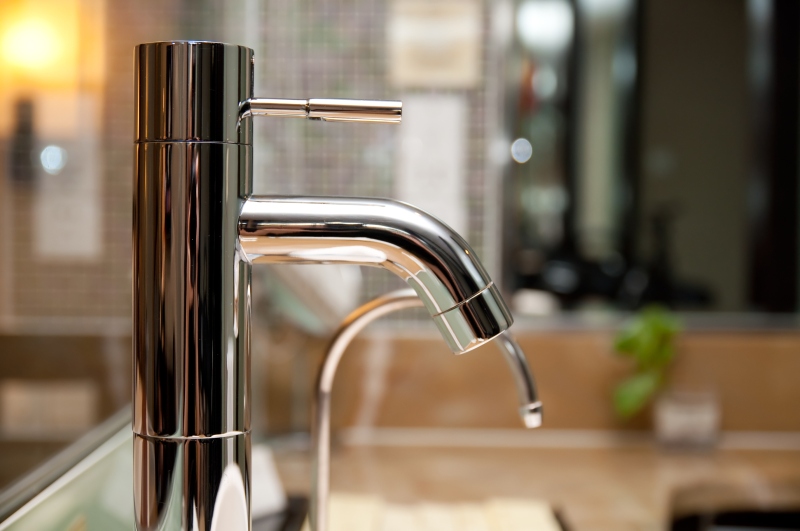 Leaking tap being repaired in Chiswick